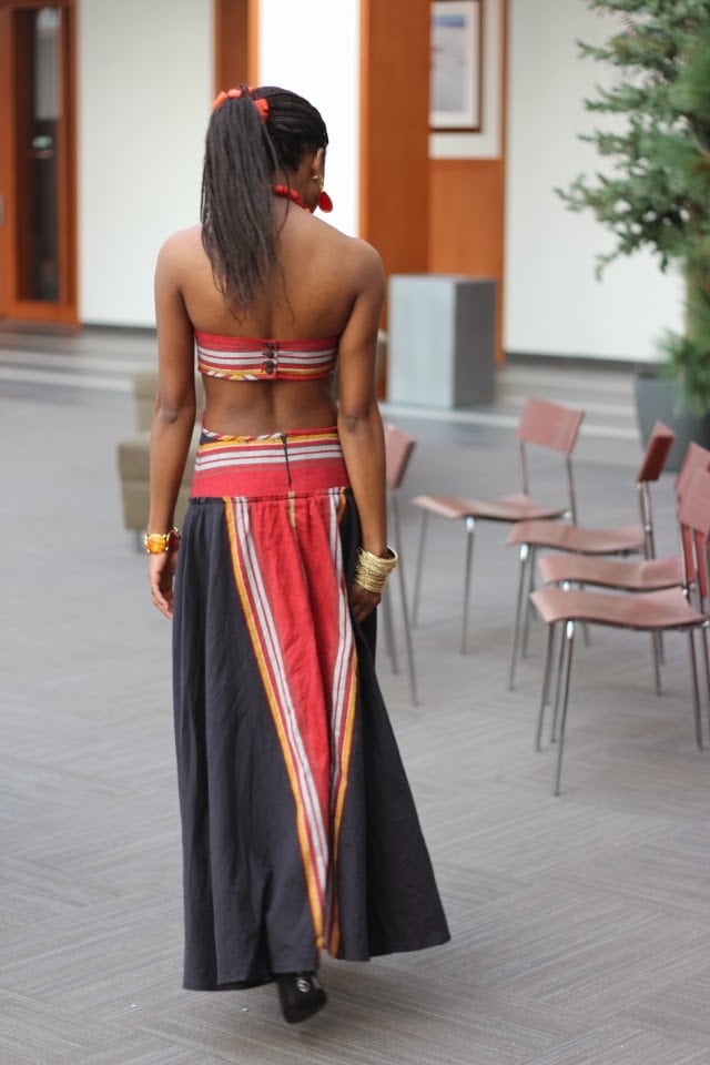 Fashion Blogger: Unique Nigerian African traditional dress paired with tribal chief beads and a sleek pair of studded heels.