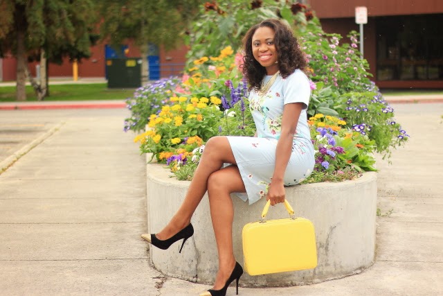Steve Madden pumps A simple and chic way to style is floral dress. Paired with an unconventional luggage purse, a mesh neckerchief, and suede pumps. A showstopper, cute outfit for fashion bloggers and fashionistas alike.