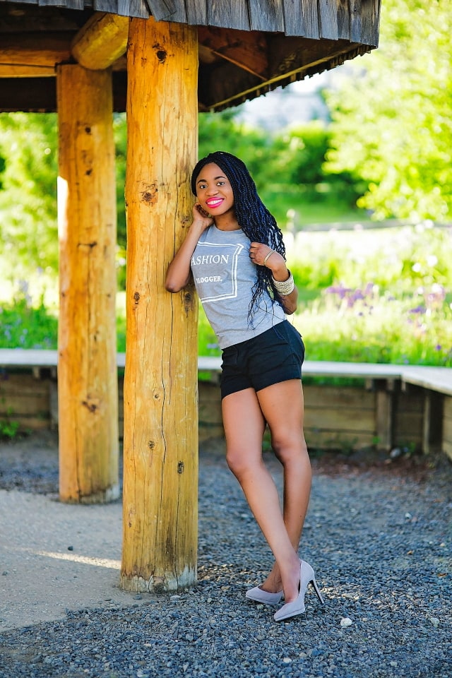 Alaska Fashion Blogger | Wearing a chic grey fashion blogger shirt, black summer shorts and stiletto heels for a stylish summer look.