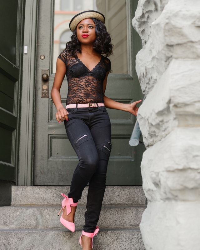 Happily Black with a touch of Pantone's 2016 color, Rose Quartz. Stun others in this backless lace bodysuit, paired with black skinny jeans, a pair of trendy bow pumps and embellished bow belt. Topped up with a straw bowler hat. Chic is an understatement. Click for more!