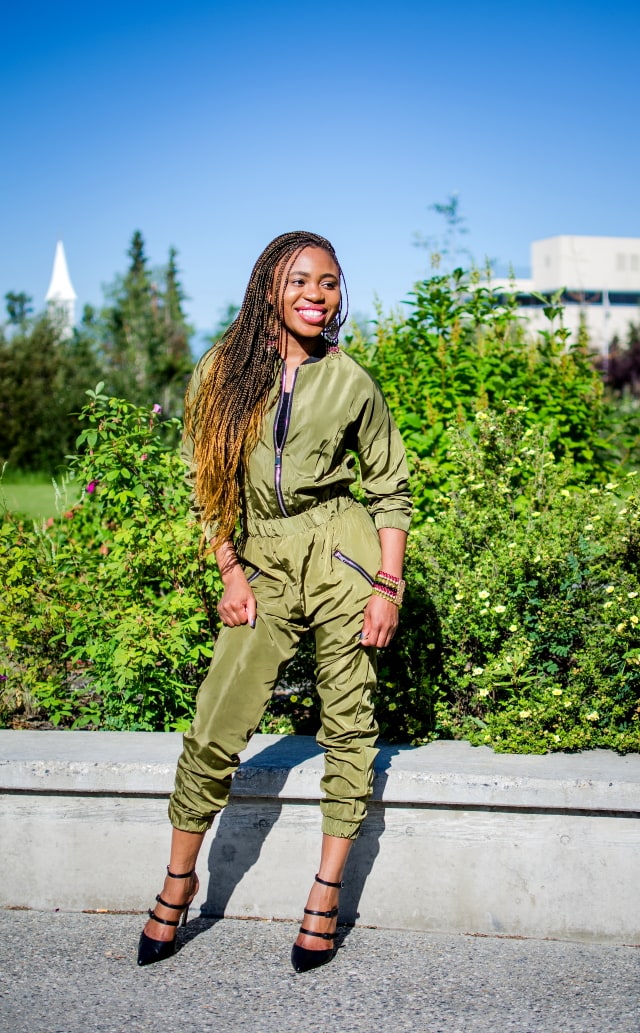 bomber jumpsuitOlive Bomber Jumpsuit | Fashion blogger rocking a one-piece, long-sleeve jumpsuit paired with a multi strap sandals for a chic street style outfit. Click to check out more of her fun and affordable style.