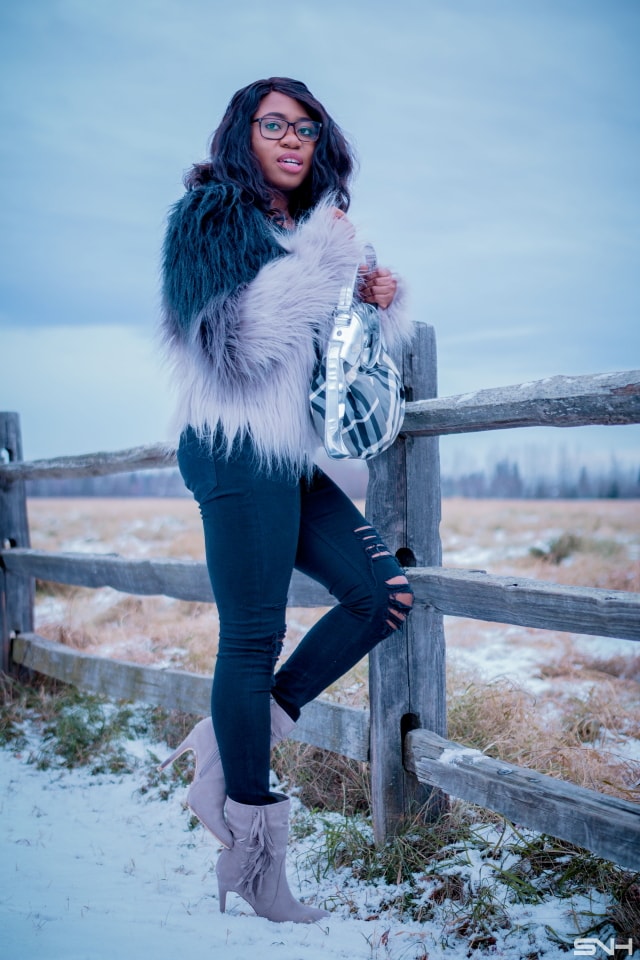 Faux fur jacket outfit | A trendy fall street style combining ombre faux fur coat, ripped black jeans, fringe ankle booties. Fashion blogger | Alaska | Black blogger | Fall fashion | Ripped denim