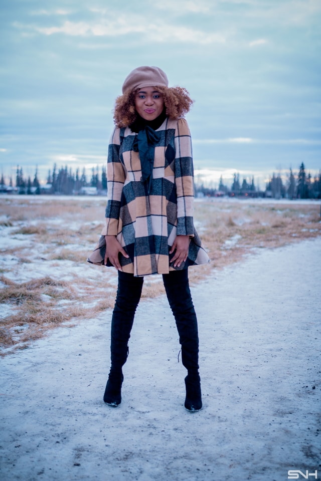 Fitted Pattern Coat + Thigh High Boots | Totally crushing over her plaid coat. The fact that she styled this street style look with a thigh high boots makes it perfect for the winter.