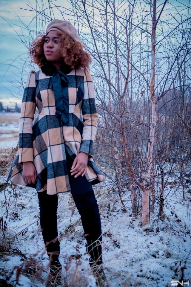 Fitted Pattern Coat + Thigh High Boots | Totally crushing over her plaid coat. The fact that she styled this street style look with a thigh high boots makes it perfect for the winter.