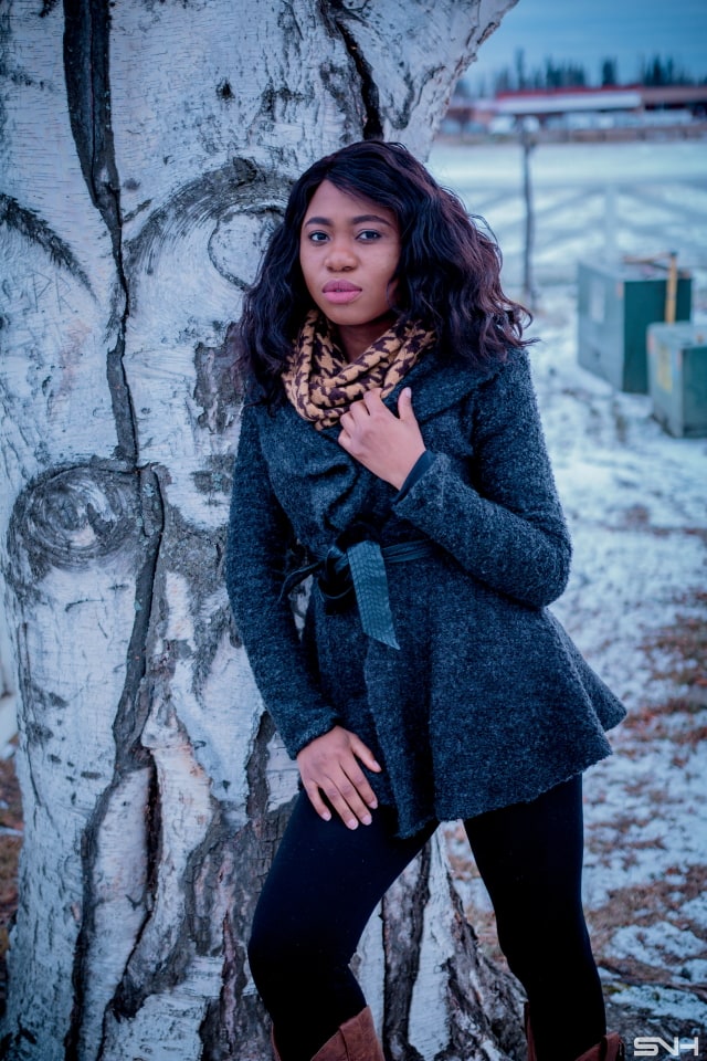 A chic way to wear a cardigan sweater this spring is to pair it with unusual pieces like she did with a fringe detailed cowboy boots. Chunky sweater | Peplum hem | Cardigan | Alaska fashion | Travel to Alaska