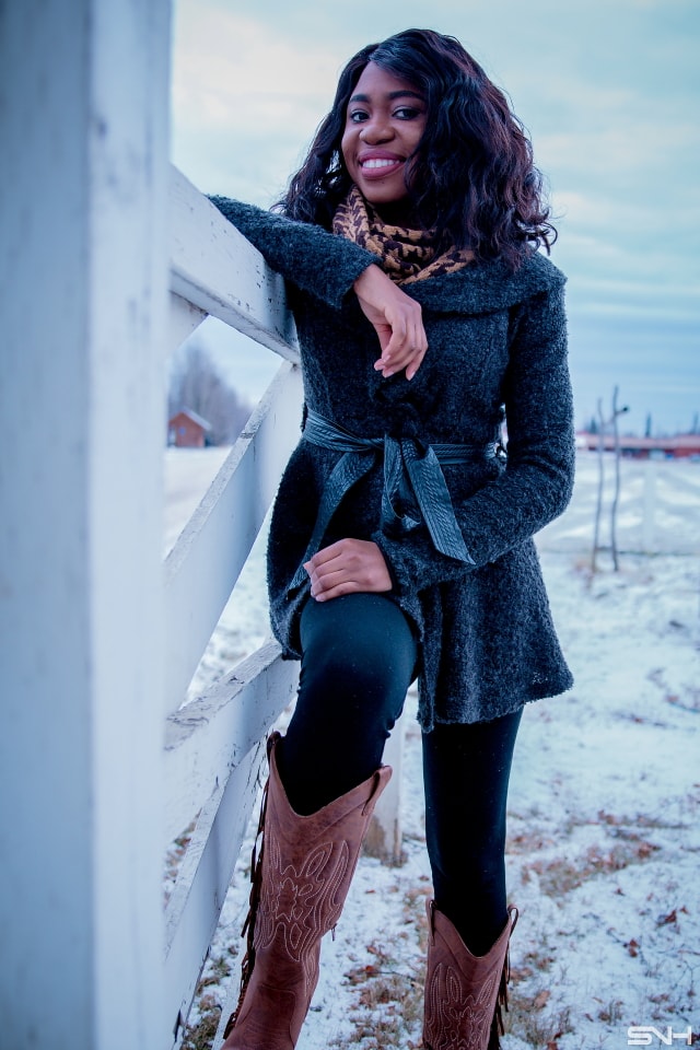 A chic way to wear a cardigan sweater this spring is to pair it with unusual pieces like she did with a fringe detailed cowboy boots. Chunky sweater | Peplum hem | Cardigan | Alaska fashion | Travel to Alaska