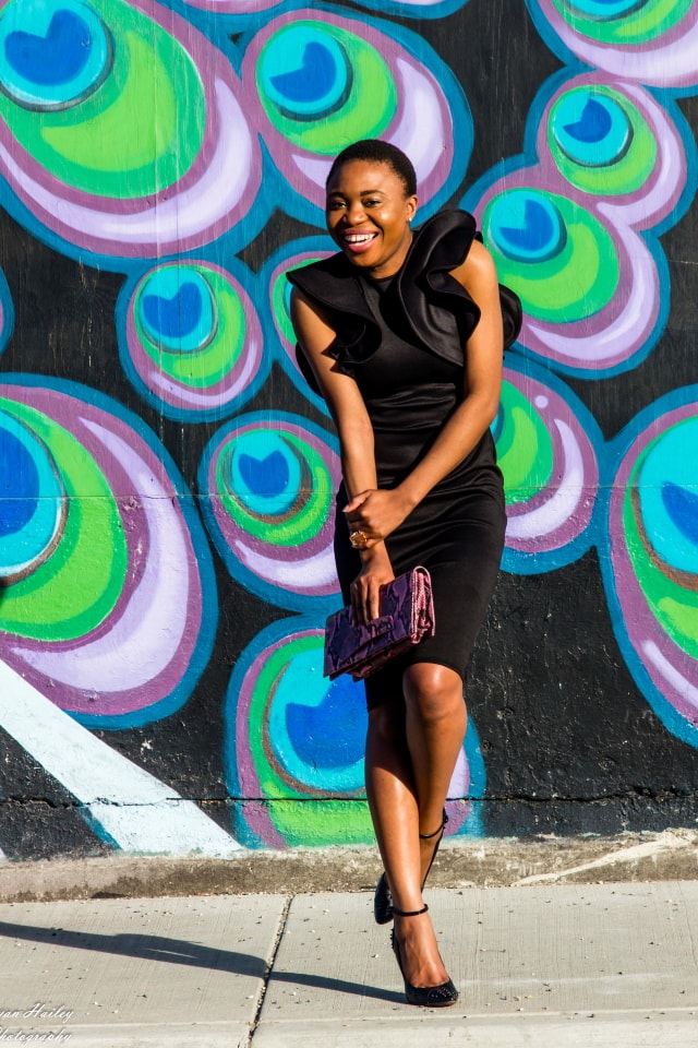 OMG! Love this black midi dress with ruffle sleeves. It'll be a perfect wedding guest look or a dressed up occasion. Love how she kept the look simple in this black monochrome look and a touch of pink. The statement sleeves, animal print purse, and studded heels make the look pop. | Summer fashion | Fashion blogger | Spring style | Spring outfit | Bodycon dress outfit | Spring fashion | Summer looks | Summer hair | Street Style | Modest fashion | Conservative style |