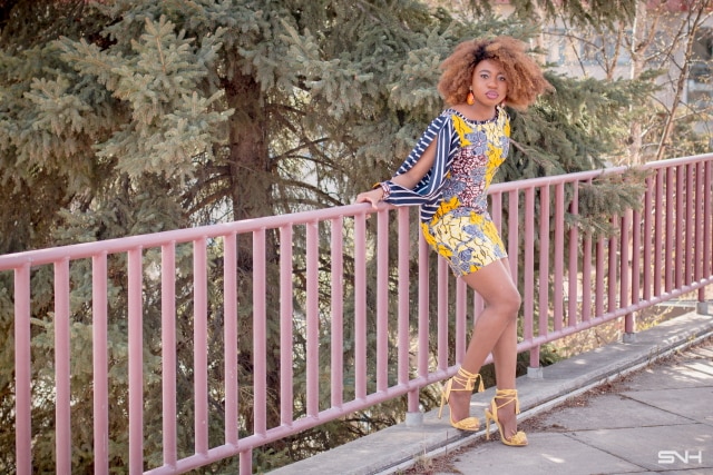 Wow! Can't get over the beauty of this African print mini dress! The chiffon slitted bubble sleeves adds a lot of sexiness to the style. I love her lace-up fringe sandals too! All about Ankara dresses | African prints | Nigerian fashion | African fashion | African print dresses | African dresses | Dashiki Dress | African clothing | Dashiki skirt | African dress styles | African print dress | African attire |