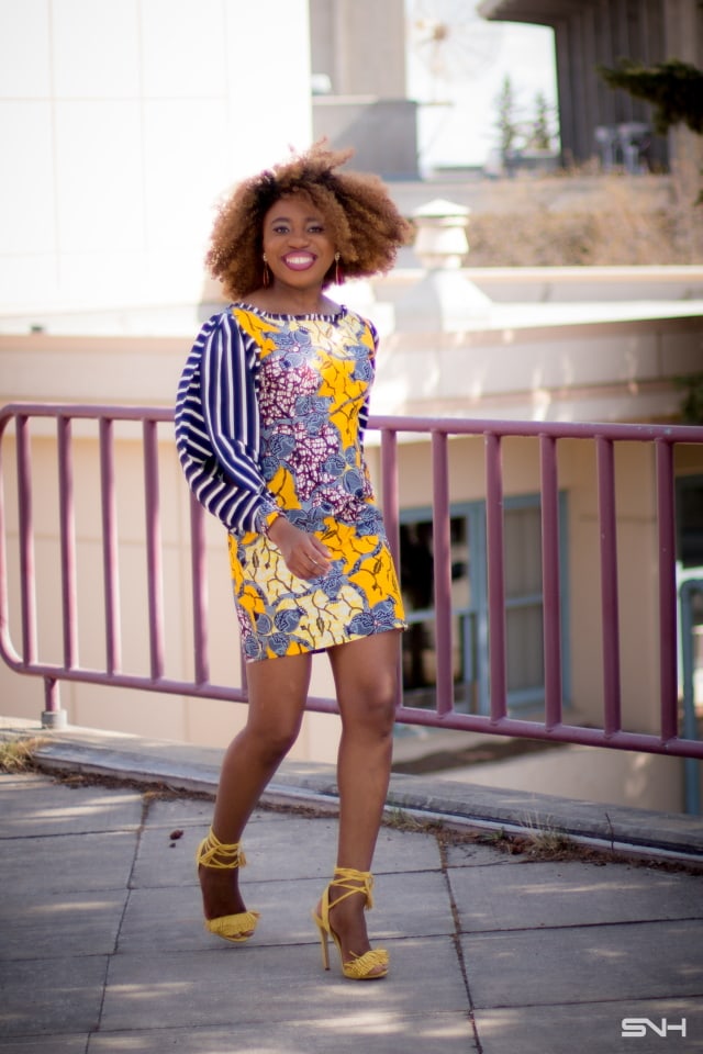 Wow! Can't get over the beauty of this African print mini dress! The chiffon slitted bubble sleeves adds a lot of sexiness to the style. I love her lace-up fringe sandals too! All about Ankara dresses | African prints | Nigerian fashion | African fashion | African print dresses | African dresses | Dashiki Dress | African clothing | Dashiki skirt | African dress styles | African print dress | African attire |