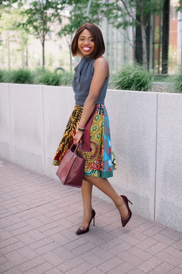 Crushing hard on her sunglasses! Love how this super cute UV polarized sunnies fits her face shape. Need her fit and flare African print dress too! African prints | Nigerian fashion | African fashion | African print clothes | ankara jackets | Dashiki Dress | African clothing | Dashiki skirt | African print styles | African print dress | African attire | Xperio UV lenses | Ray Ban | sunglasses