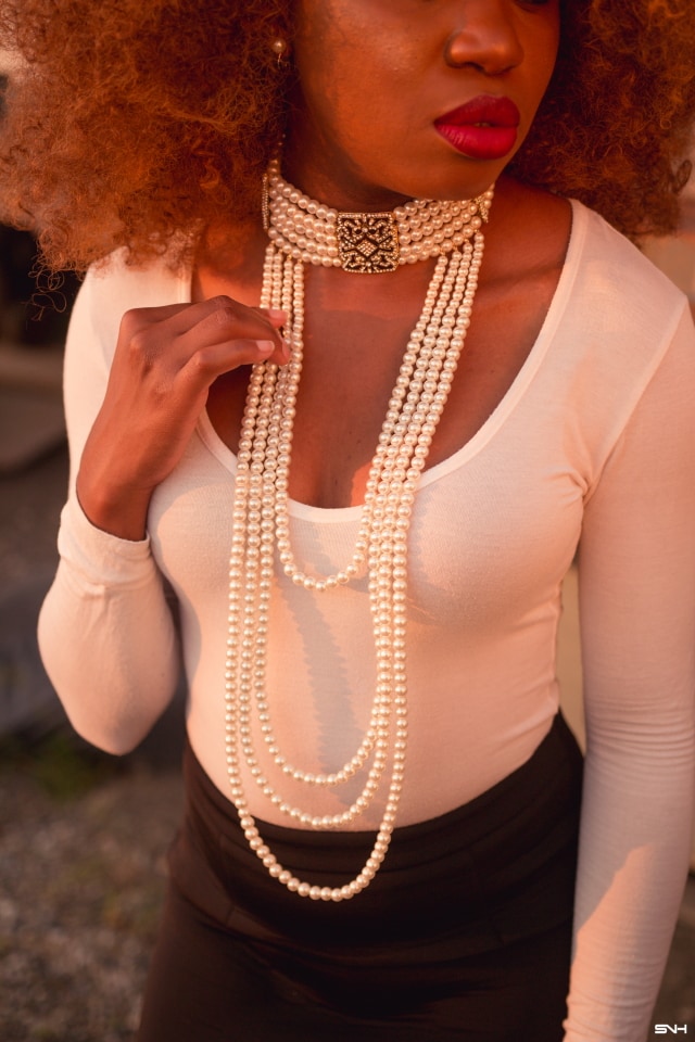 She's stunning and I'm obsessed with her black and white monochrome outfit! White long sleeve bodysuit with deep V neck combined with an two tone neoprene peplum skirt and beaded heeled sandals and the perfect statement choker from Amrita Singh jewelry. Work style, dressy outfit, women's style, black girl, Nigerian blogger