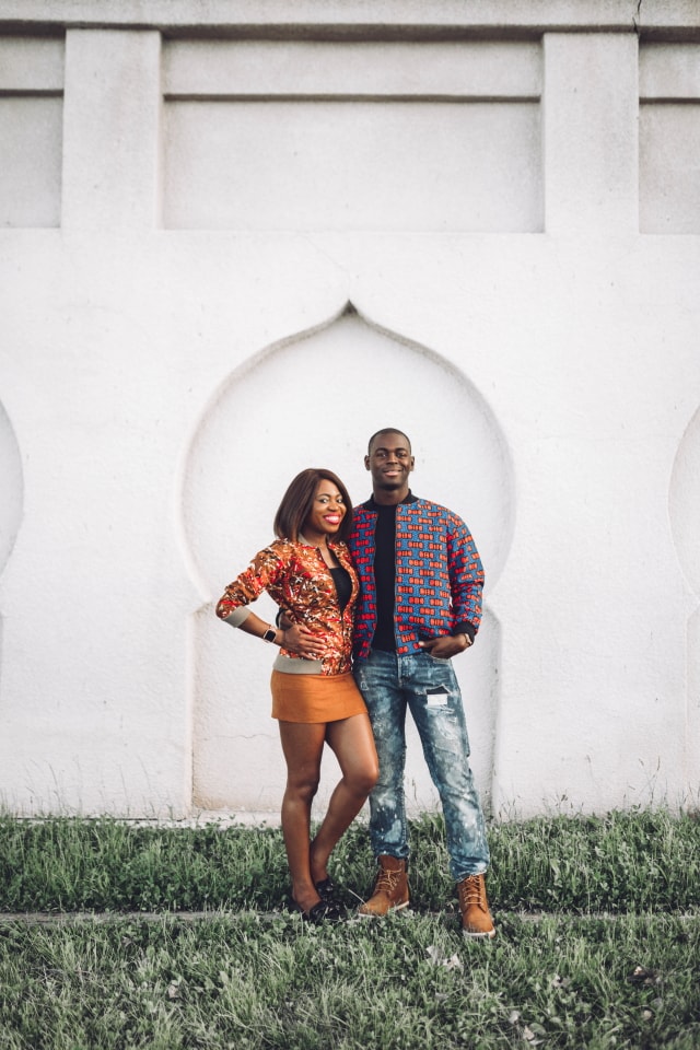 Couple goals! They look so stylish in their African print bomber jacket. ❤️ ❤️ Love how they're subtly matching with her suede mini skirt snd his tan Timberland. Ankara, Dutch wax, Kente, Kitenge, dashiki, ankara bomber jacket, African fashion, African clothing, African prints, Nigerian style, Ghanaian fashion, bomber jacket, Kenya fashion, Nigerian fashion
