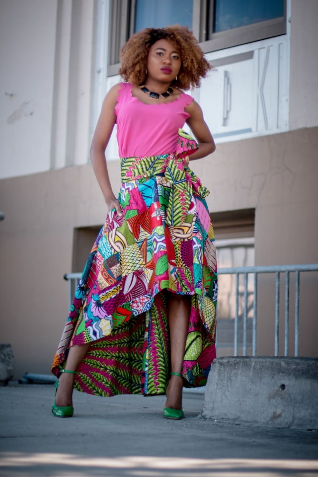 Slay mama! This African wax print high low skirt is irresistible! Everything about this skirt is classy and vibrant. ? Now I see why African print is all the rave. I need this patchwork beauty in my wardrobe. Ankara, Dutch wax, Kente, Kitenge, dashiki, ankara maxi skirt, African fashion, African clothing, African prints, Nigerian style, Ghanaian fashion, bomber jacket, Kenya fashion, Nigerian fashion