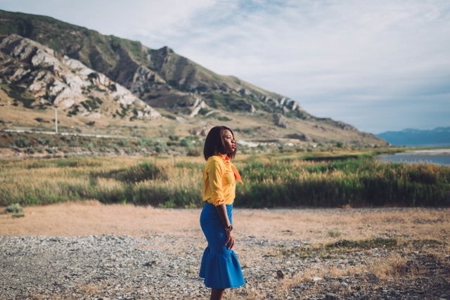 Never thought blue & yellow would look this good! Very work appropriate and stylish with the neck tie bow and peplum midi skirt. ?? Work style, dressy outfit, women's style, black girl, Nigerian blogger, pussy bow top, neoprene skirt, iridescent hologram heels