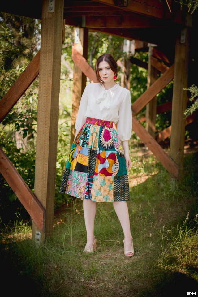 Girl gang African fashion! Love how she styled this ankara African print patchwork midi skirt. She wore this colorful piece so well! Summer style, dutch wax, kente, kitenge, dashiki, African styles, African prints, Nigerian style, Ghana fashion #ankara #africanprint