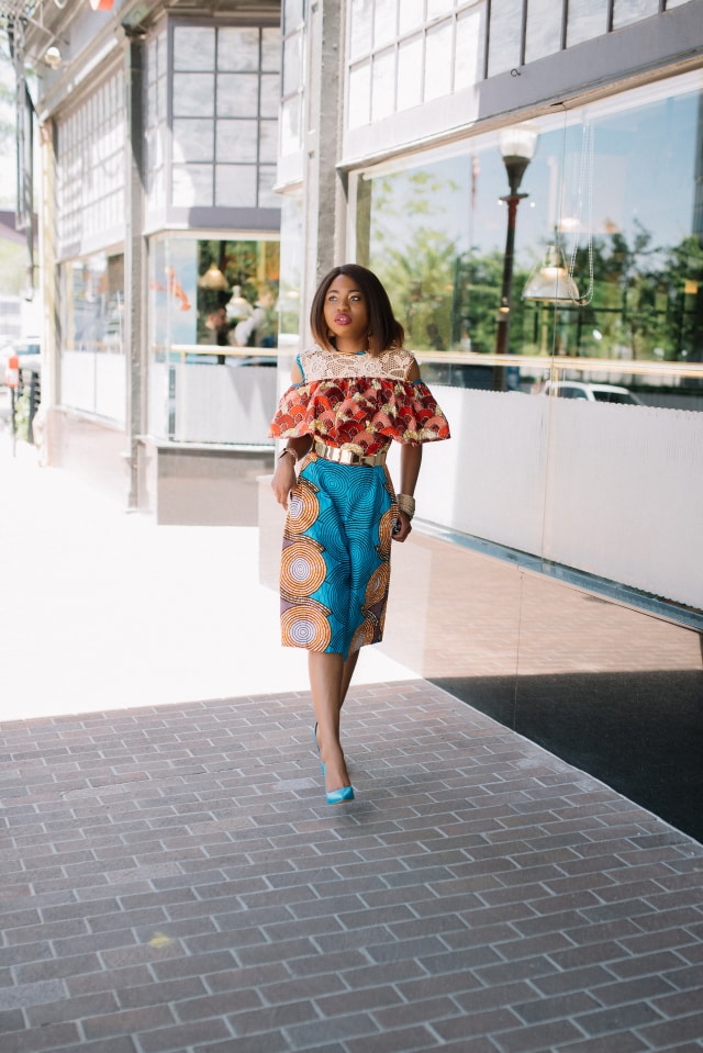 Such a stunningly irresistible African print romper! I wouldn't be surprised if she stopped traffic wearing this elegant mixed print ankara African style. The cold shoulder, lace detail and matching blue heels definitely make this outfit a hit! Adding to my wishlist as a gift idea today. Fall style, dutch wax, kente, kitenge, dashiki, African styles, African prints, Nigerian style, senegal fashion #ankara #africanprint #kente #ootd #romper