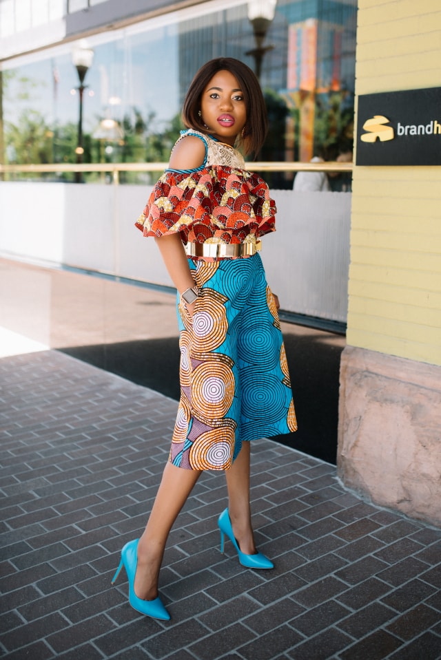 Such a stunningly irresistible African print romper! I wouldn't be surprised if she stopped traffic wearing this elegant mixed print ankara African style. The cold shoulder, lace detail and matching blue heels definitely make this outfit a hit! Adding to my wishlist as a gift idea today. Fall style, dutch wax, kente, kitenge, dashiki, African styles, African prints, Nigerian style, senegal fashion #ankara #africanprint #kente #ootd #romper