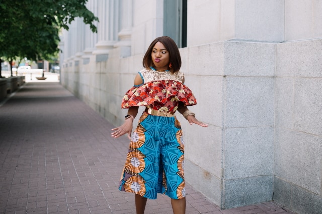 Such a stunningly irresistible African print romper! I wouldn't be surprised if she stopped traffic wearing this elegant mixed print ankara African style. The cold shoulder, lace detail and matching blue heels definitely make this outfit a hit! Adding to my wishlist as a gift idea today. Fall style, dutch wax, kente, kitenge, dashiki, African styles, African prints, Nigerian style, senegal fashion #ankara #africanprint #kente #ootd #romper