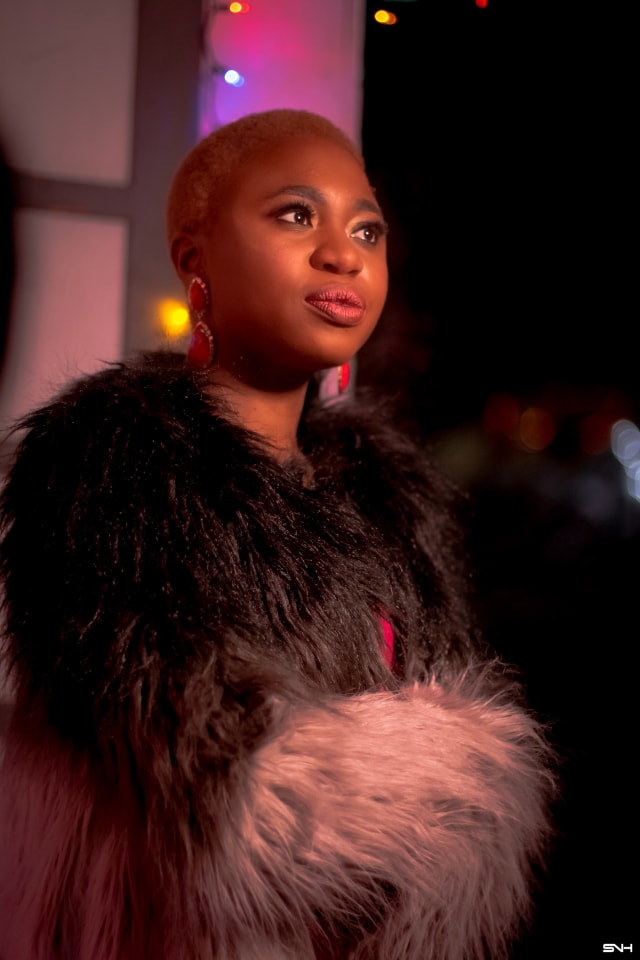 Such a stunningly ​holiday party outfit!​ The unique combination of beautiful pieces makes her out so elegant. ​Obsessed with her faux fur ombre coat paired with that yellow pants with bow details. The perfect holiday look for office parties! #ootd #winterstyle #holidaystyle