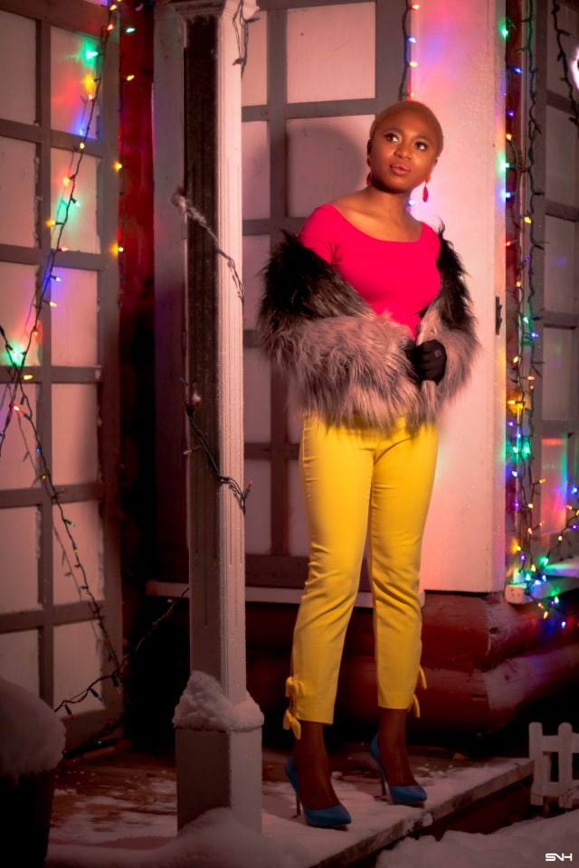Such a stunningly ​holiday party outfit!​ The unique combination of beautiful pieces makes her out so elegant. ​Obsessed with her faux fur ombre coat paired with that yellow pants with bow details. The perfect holiday look for office parties! #ootd #winterstyle #holidaystyle
