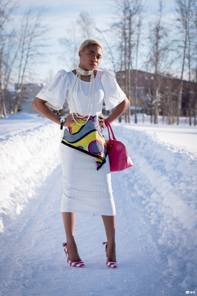 Oh yes! This African print peplum dress is making me feel all sorts of excited about modern African dress styles. That asymmetrical peplum and exaggerated sleeves scream bold, classy and stylish. And that vibrant slingback pumps, choker necklace and dome satchel? I'm excited to see more stunning ankara styles like this! #africanprint #ankarafashion #ankara #kente #wakanda