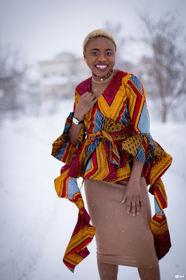 If you thought African print couldn't get better, you'd be surprised! Totally lusting on this handmade African print wrap blouse. The colors and style make a bold statement. Definitely not one for the faint of heart. Loving the contemporary twist with a jersey midi skirt and classic pumps. All that peplum detail got me obsessed! #ankara #africanprint #ankarafashion #nigerian