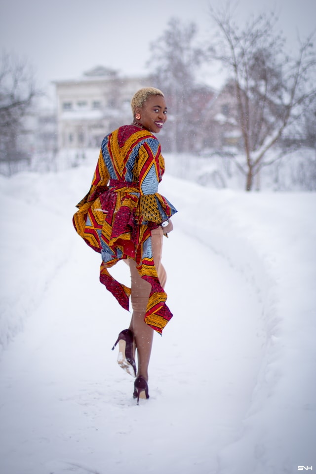 If you thought African print couldn't get better, you'd be surprised! Totally lusting on this handmade African print wrap blouse. The colors and style make a bold statement. Definitely not one for the faint of heart. Loving the contemporary twist with a jersey midi skirt and classic pumps. All that peplum detail got me obsessed! #ankara #africanprint #ankarafashion #nigerian