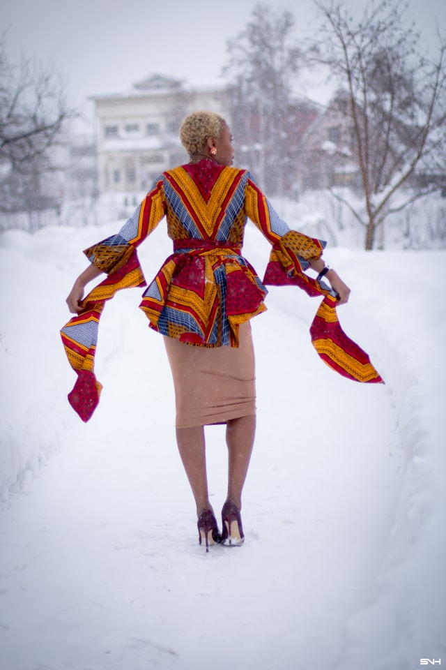 If you thought African print couldn't get better, you'd be surprised! Totally lusting on this handmade African print wrap blouse. The colors and style make a bold statement. Definitely not one for the faint of heart. Loving the contemporary twist with a jersey midi skirt and classic pumps. All that peplum detail got me obsessed! #ankara #africanprint #ankarafashion #nigerian