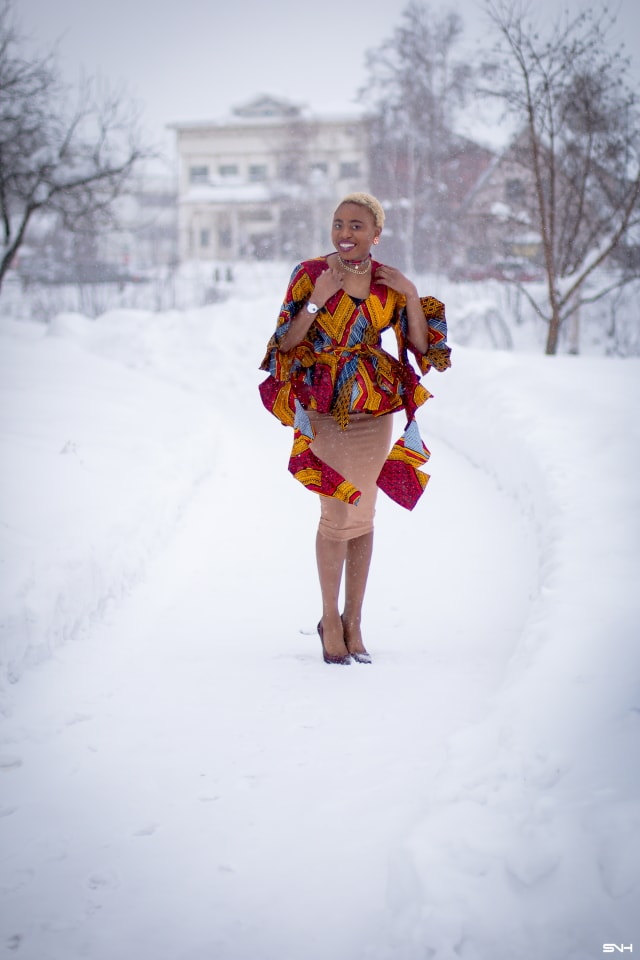 If you thought African print couldn't get better, you'd be surprised! Totally lusting on this handmade African print wrap blouse. The colors and style make a bold statement. Definitely not one for the faint of heart. Loving the contemporary twist with a jersey midi skirt and classic pumps. All that peplum detail got me obsessed! #ankara #africanprint #ankarafashion #nigerian