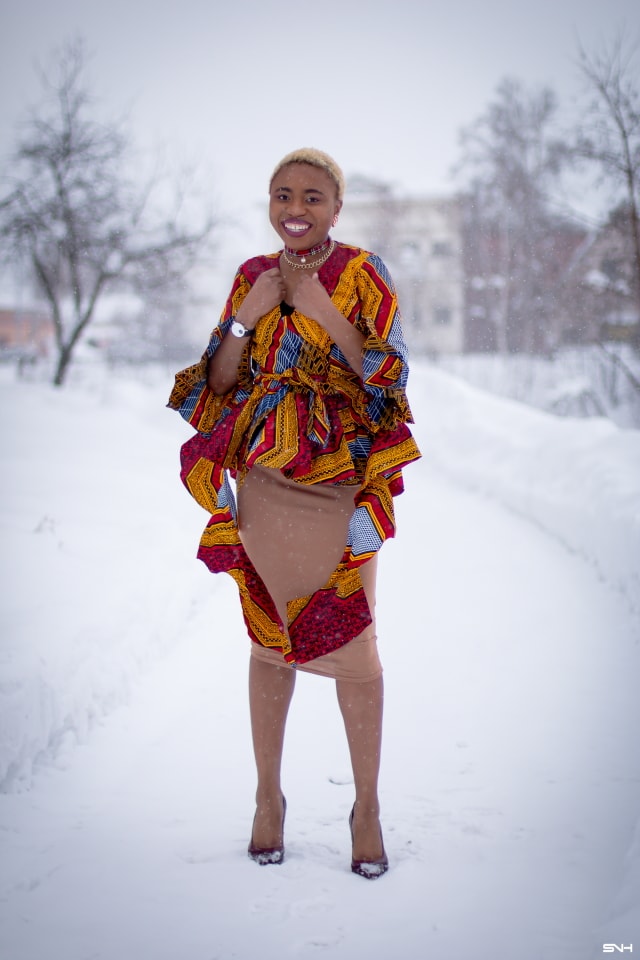 If you thought African print couldn't get better, you'd be surprised! Totally lusting on this handmade African print wrap blouse. The colors and style make a bold statement. Definitely not one for the faint of heart. Loving the contemporary twist with a jersey midi skirt and classic pumps. All that peplum detail got me obsessed! #ankara #africanprint #ankarafashion #nigerian