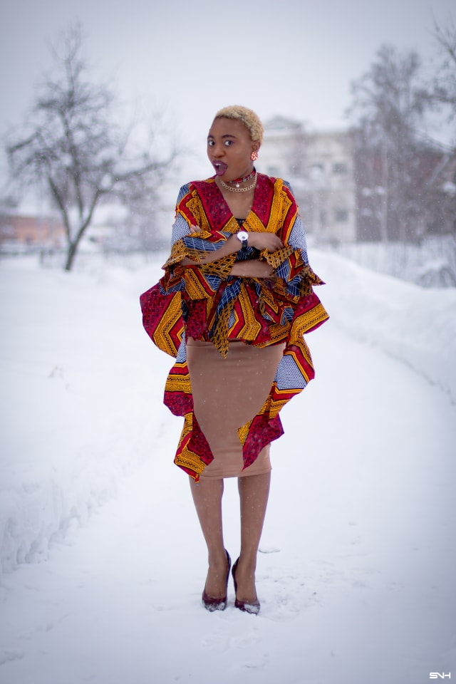 If you thought African print couldn't get better, you'd be surprised! Totally lusting on this handmade African print wrap blouse. The colors and style make a bold statement. Definitely not one for the faint of heart. Loving the contemporary twist with a jersey midi skirt and classic pumps. All that peplum detail got me obsessed! #ankara #africanprint #ankarafashion #nigerian