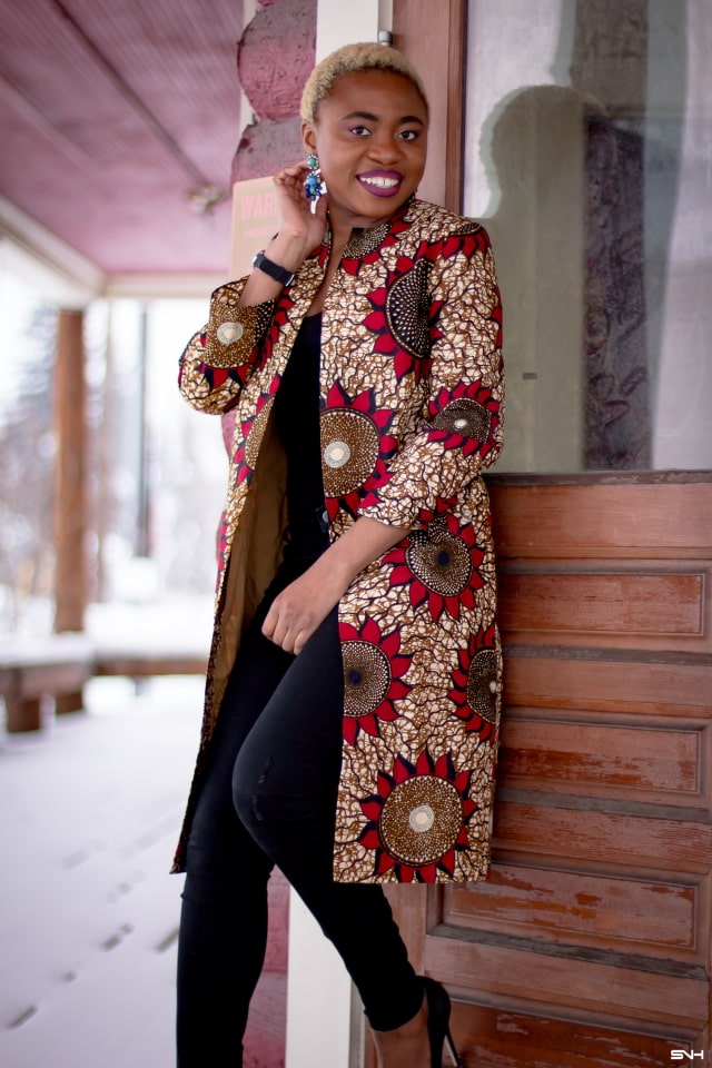 Just when you thought you would never find the perfect lightweight coat, you find the best. Crushing on this handmade ankara print duster coat! The colors, the cut and the way this fashion blogger styled it is pure perfection. The black bodysuit, fitted denim, and classic black heels truly allows the duster coat shine. #ankara #africanprint #ankarafashion #nigerian