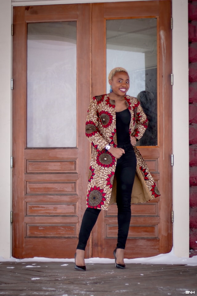Just when you thought you would never find the perfect lightweight coat, you find the best. Crushing on this handmade ankara print duster coat! The colors, the cut and the way this fashion blogger styled it is pure perfection. The black bodysuit, fitted denim, and classic black heels truly allows the duster coat shine. #ankara #africanprint #ankarafashion #nigerian