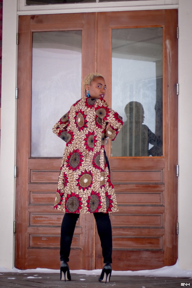 Just when you thought you would never find the perfect lightweight coat, you find the best. Crushing on this handmade ankara print duster coat! The colors, the cut and the way this fashion blogger styled it is pure perfection. The black bodysuit, fitted denim, and classic black heels truly allows the duster coat shine. #ankara #africanprint #ankarafashion #nigerian