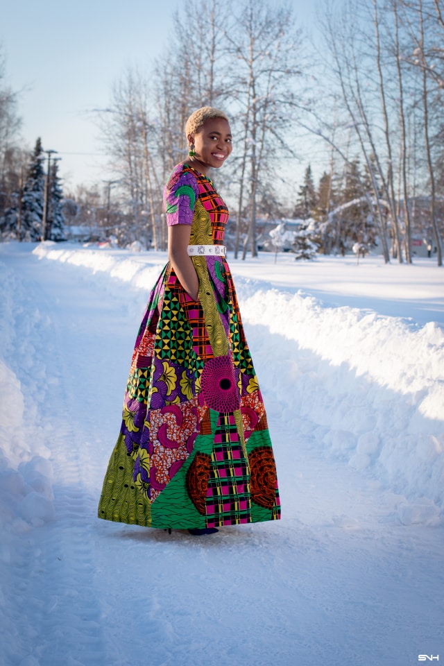 Louisa Moje shares unique African styles in this 20 days series of African print fashion. Day 1 starts with a bang in this phenomenal mixed African print maxi dress by Habby Rose. She brought this patchwork ankara design together with a statement waist belt, D'orsay heels, and minimal jewelry. #africanprint #ankarafashion