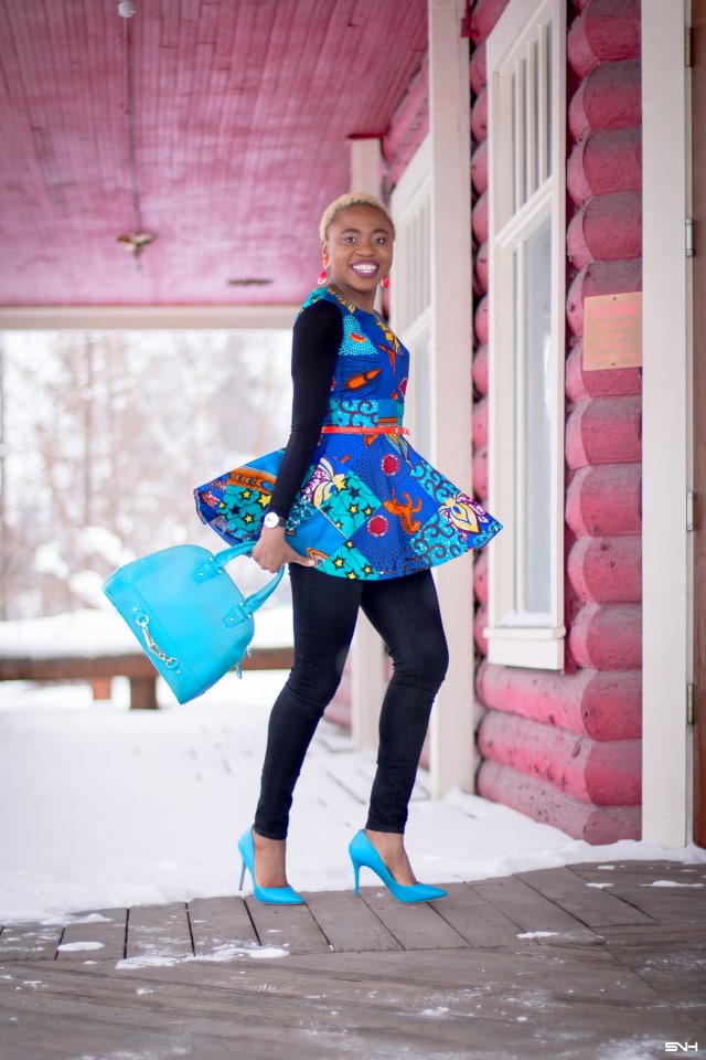 This African print peplum top has me obsessed with ankara styles and patchwork designs. Fashion blogger, Louisa shares a breathtaking patchwork ankara top as part of a 20+ days of African print fashion. Looking for a upgraded casual way to rock African print today, check out this look from Day 2 of the series by With Flare Designs. The pops of blue and orange contrasts beautifully on the black denim and bodysuit. #africanprint #ankara #ankarafashion #kente