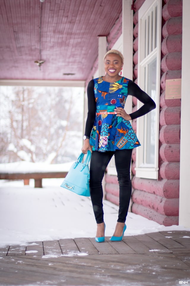 This African print peplum top has me obsessed with ankara styles and patchwork designs. Fashion blogger, Louisa shares a breathtaking patchwork ankara top as part of a 20+ days of African print fashion. Looking for a upgraded casual way to rock African print today, check out this look from Day 2 of the series by With Flare Designs. The pops of blue and orange contrasts beautifully on the black denim and bodysuit. #africanprint #ankara #ankarafashion #kente