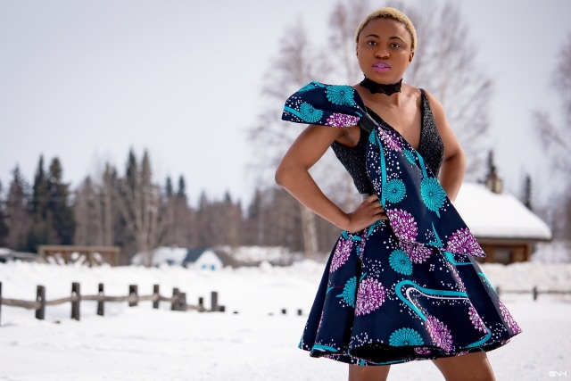 Millennial fashion and beauty blogger, Louisa takes us on an epic fashion series showcasing some of the most spectacular, wearable African print styles we've ever seen! Case in point, this elaborate African print cocktail dress made with premium ankara fabric mixed with a sequin V neck fabric and an exposed back. And oh, she makes winter in Alaska look so balmy! Dashiki, African print dress, African fashion, African women dresses, African prints, Nigerian style, Nigerian fashion