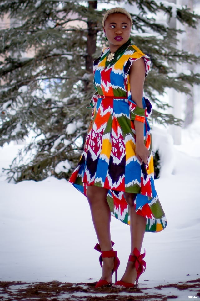 Louisa Moje is a Nigerian fashion blogger who runs La Passion Voutee. Her refined style, vibrant and elegant African print outfits invite you on a colorful and artist journey. Her ankara fashion series like this African print high-low dress featuring African print designers around the world has been a hit. The way she gracefully showcases these beautiful prints against the Alaska snow make her looks stand out. #ankara #africanprint #ankarafashion #nigerian