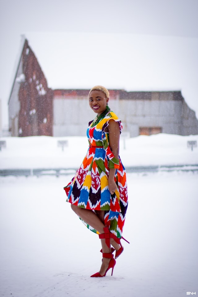 Louisa Moje is a Nigerian fashion blogger who runs La Passion Voutee. Her refined style, vibrant and elegant African print outfits invite you on a colorful and artist journey. Her ankara fashion series like this African print high-low dress featuring African print designers around the world has been a hit. The way she gracefully showcases these beautiful prints against the Alaska snow make her looks stand out. #ankara #africanprint #ankarafashion #nigerian