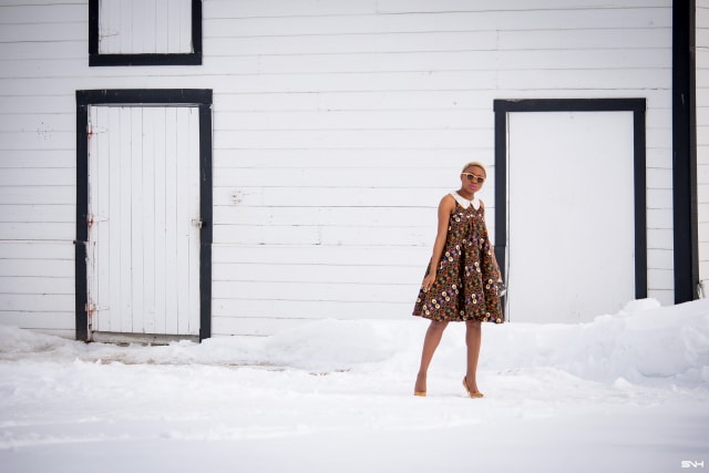 Fashion blogger, Louisa takes us on a month-long series rocking the prettiest African print styles. This ankara flared dress as me oohing and ahhing. The perfect dress for a balmy summer dress. The free-flowing form makes the African print dress a breathable and comfortable option. Love how she makes winter look so warm! #ankara #africanprint #ankarafashion Kitenge, Dashiki, African print dress, African fashion, African women dresses, African prints, Nigerian styleNigerian fashion