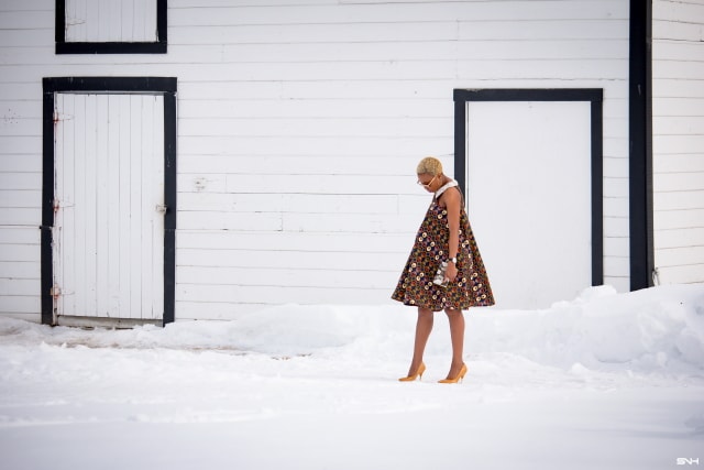 Fashion blogger, Louisa takes us on a month-long series rocking the prettiest African print styles. This ankara flared dress as me oohing and ahhing. The perfect dress for a balmy summer dress. The free-flowing form makes the African print dress a breathable and comfortable option. Love how she makes winter look so warm! #ankara #africanprint #ankarafashion Kitenge, Dashiki, African print dress, African fashion, African women dresses, African prints, Nigerian styleNigerian fashion