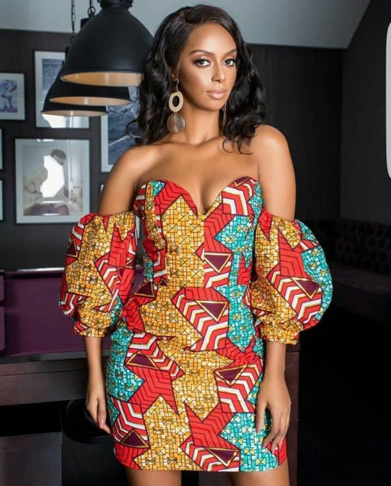 An epic roundup of over 45 elegant wax print African print dresses in 2019. Plus details on where to get the best ankara maxi dress without spending a fortune. From ankara Dutch wax, Kente, to Kitenge and Dashiki. All your favorite styles in one place. Click to see all! #africanfashionoutfits #kente