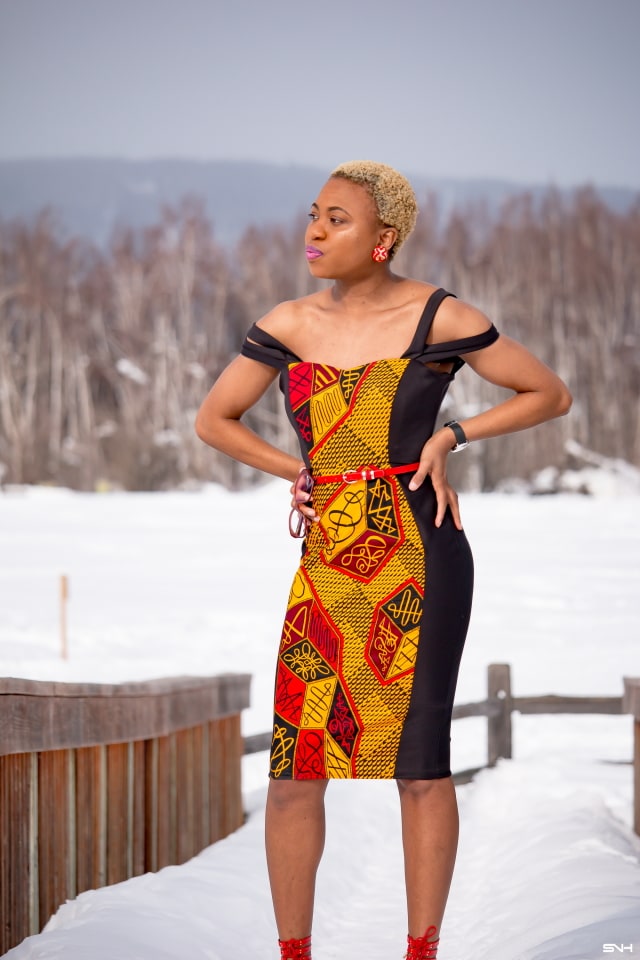 I'm quite obsessed with this African print off-shoulder dress. The stretchy fabric, multi-straps, and black tuxedo style creates a look that I love. The simple haircut, natural makeup, and clear sunnies is so clean and chic. This formal dress is perfect for any special occassion! #ankara #dashiki #kente