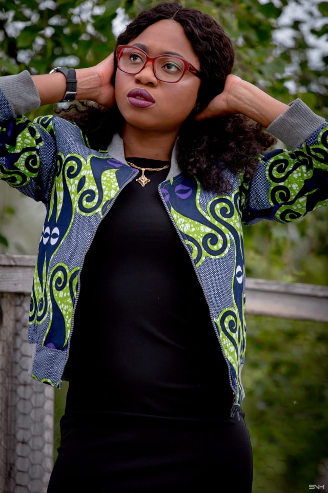 This is the only ankara jacket you need right now! Make a bold statement today in this stylish reversible ankara bomber jacket. Both a completer piece and a transitional outfit, this African print bomber jacket can be worn all year round. Get the scoop on this African bomber jacket and where to score cheap African jackets on the blog. #wakanda Dashiki, African fashion, African prints, Nigerian style Ankara, Dutch wax, Kente, Kitenge, Nigerian fashion, ankara crop top