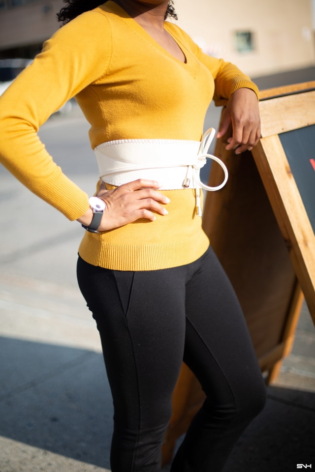 Finally a simple and practical way to style a bright color sweater. Love how she styled this mustard yellow sweater outfit with a complementary cream color obi belt. The two-tone ballet flats ties the entire look together! This fall look is all about yellow sweaters, yoga pants, pullover sweaters, Alaska blogger, New Jersey fashion blogger, and cozy outfits.