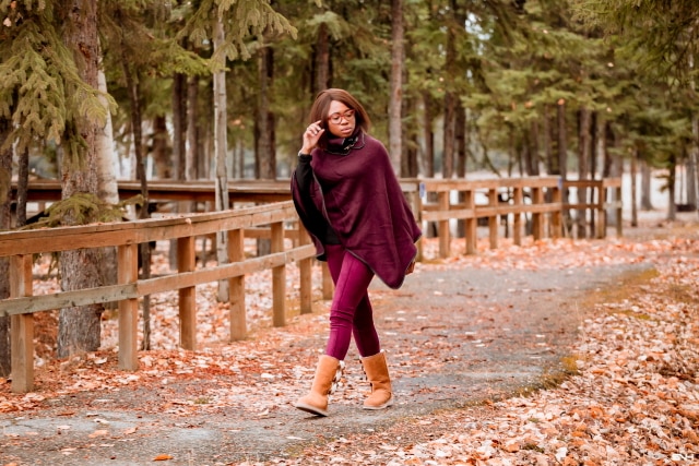 A winter outfit pairing a cowl neck poncho layered over an insulated fleecewear and super chic and comfortable burgundy faux suede leggings and the coziest Koolaburra by UGG boots. This is a practical and fashionable look that can be worn and remixed with other wardrobe essentials while keeping you warm on cold weather days. This post is all about winter fashion, fall fashion, New Jersey fashion blogger, black style blogger.