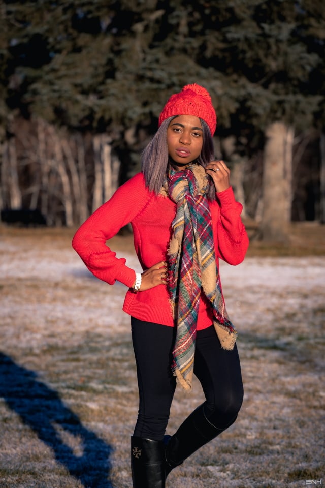 A fun and vibrantly beautiful cold weather outfit wearing a pullover sweater, highly-rated Zella leggings, and a pair of chic riding boots. This is a practical and stylish cold weather look that can be worn time and time again during colder months. This post is all about winter outfits, Alaska fashion, New Jersey fashion blogger, black style blogger.