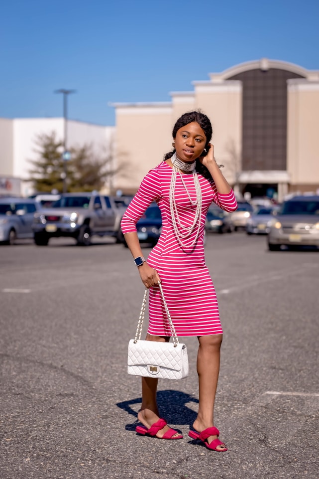 Style blogger, Louisa shows us how to style the best Amazon bodycon dress. She breaks down how to transform this 3/4 sleeve dress by pairing it with slingback striped sandals, a quilted structured purse (Chanel-inspired bag), and statement jewelry for the ultimate date night outfit or cocktail dress. Next, she styles it with a pair of pink braided slides. With so many summer outfit options, you’re not going to believe how cheap this pencil dress is. This post covers summer outfits, summer dresses, bow pumps #amazonfinds #amazonhaul #amazonfashion