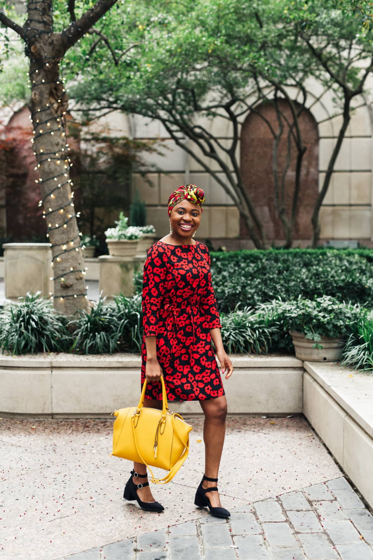 Celebrating the union between two cultures rocking an ankara head wrap with a floral dress perfect for spring and summer fashion. And sharing the best places to score the most stylish African print scarves for women. #africanfashion #floraldress #ankarastyles #turban